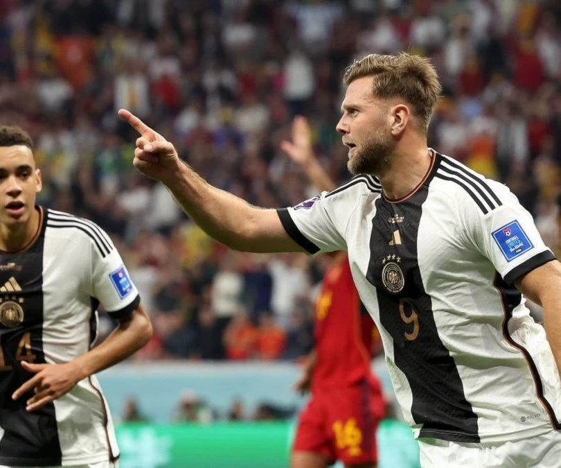 Niclas Fuellkrug of Germany celebrates after scoring Germany's first goal during the FIFA World Cup Qatar 2022 against Spain at Al Bayt Stadium on November 27, 2022, Qatar (Getty Images) Niclas Fuellkrug of Germany celebrates after scoring Germany's first goal during the FIFA World Cup Qatar 2022 against Spain at Al Bayt Stadium on November 27, 2022, Qatar (Getty Images)