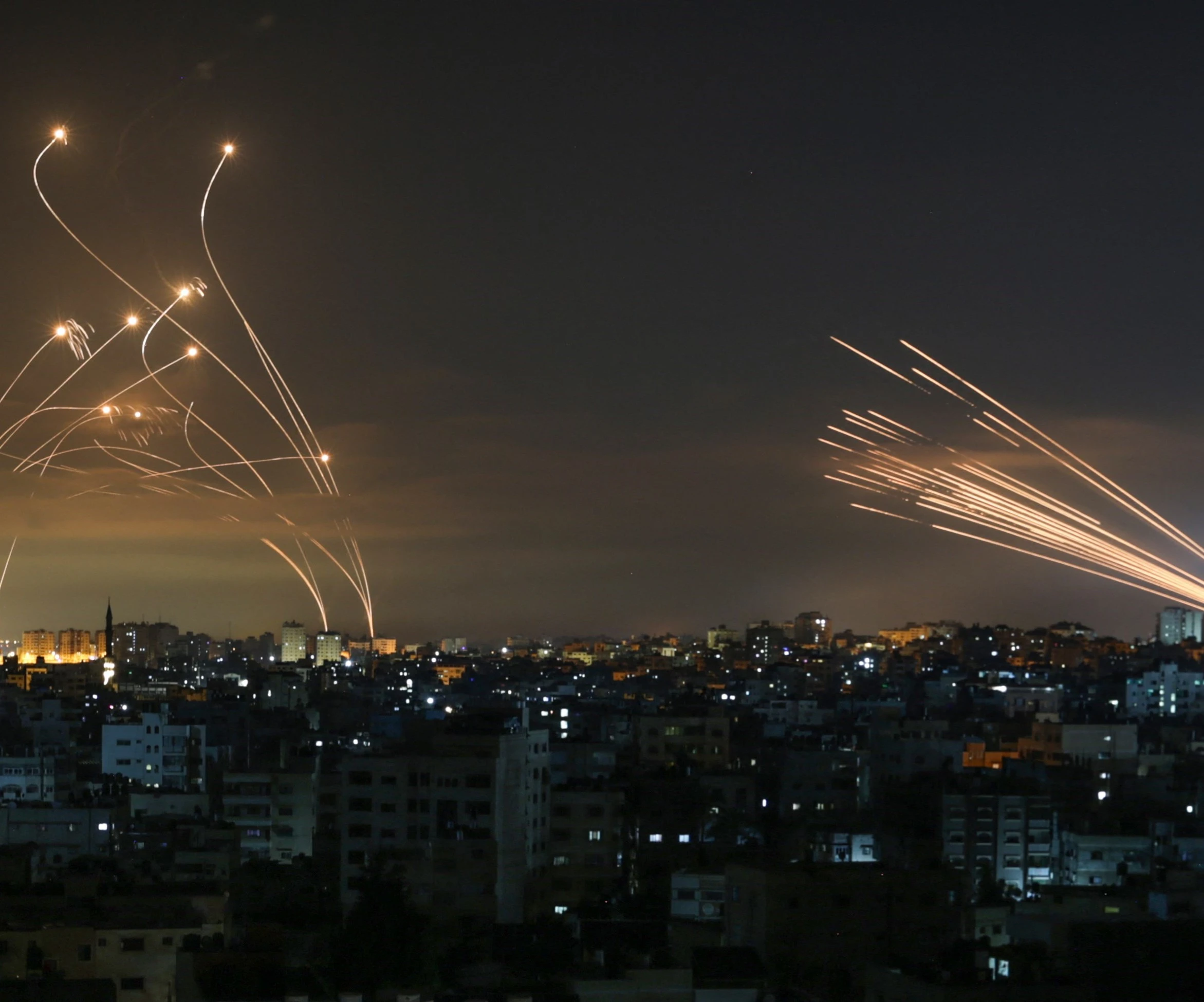 Rockets fired from Gaza toward occupied Palestinian territories (R) and Israeli Iron Dome interceptors (R) Rockets fired from Gaza toward occupied Palestinian territories (R) and Israeli Iron Dome interceptors (R)
