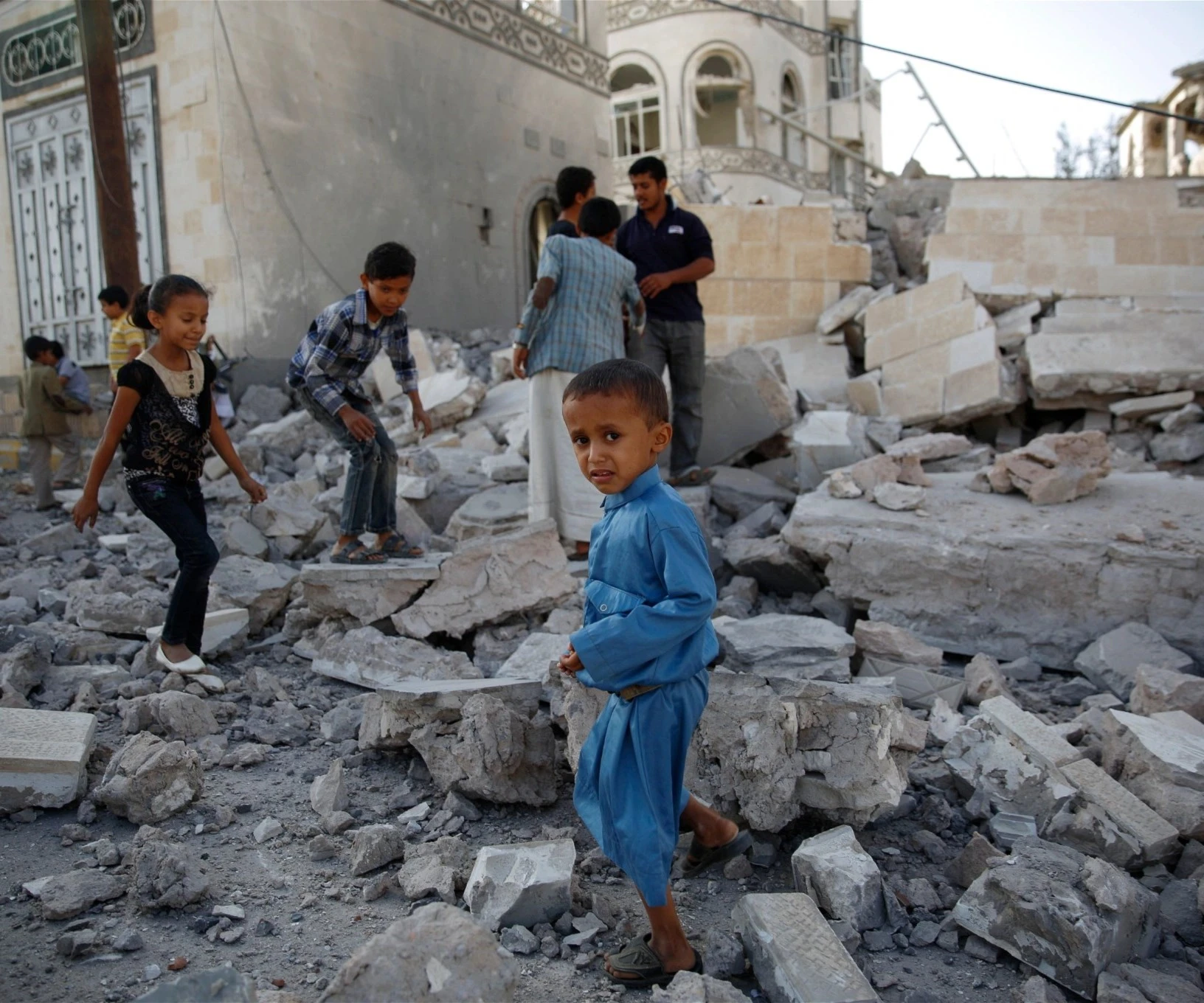 Children play amid the rubble of a house destroyed by a 2015 Saudi-led airstrike in Yemen's capital Sanaa (AP Photo) Children play amid the rubble of a house destroyed by a 2015 Saudi-led airstrike in Yemen's capital Sanaa (AP Photo)