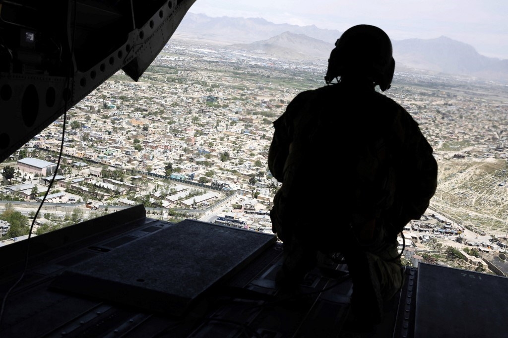 A US soldier guarding the chopper transporting ex-US Defense Secretary James Mattis in Kabul in 2017