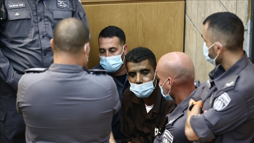 Palestinian escapee Zakaria Zubeidi, one of the Gilboa Prison escapees, surrounded by Israeli occupation police during his trial in An-Nasira, Occupied Palestine, September 11, 2021 | AA