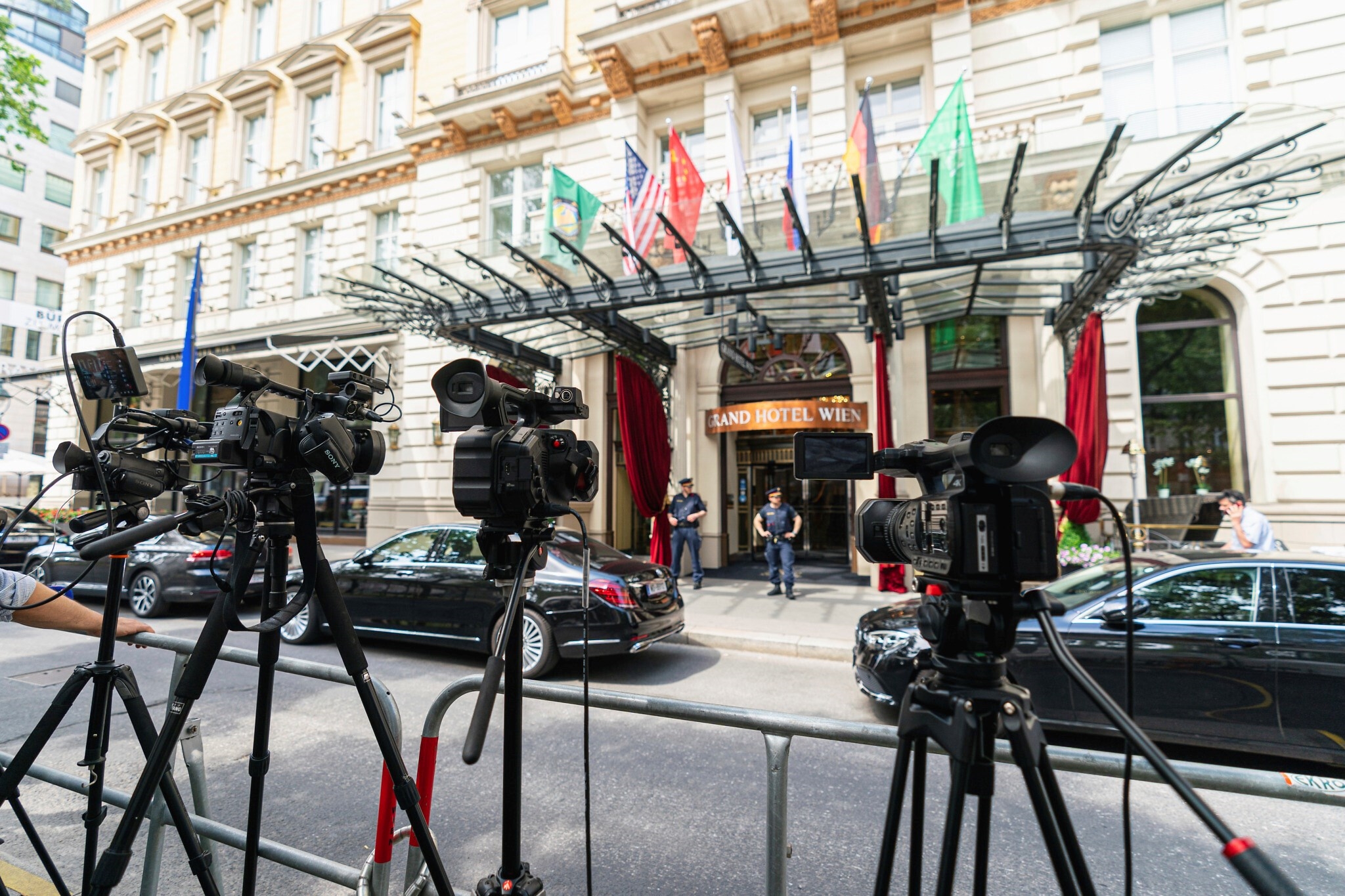 TV cameras pointed toward the entrance of the hotel where the Vienna talks took place, Austria, June 20,2021 (AFP)