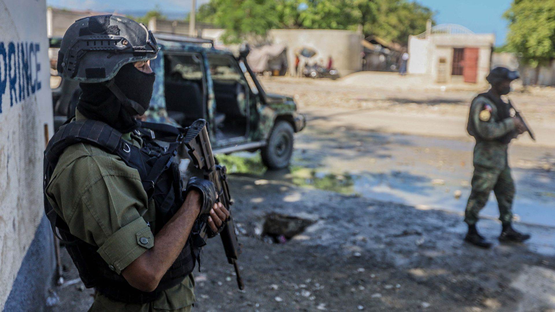Haitian soldiers guard the public prosecutor's office in Port-au-Prince earlier this month.(AFP)