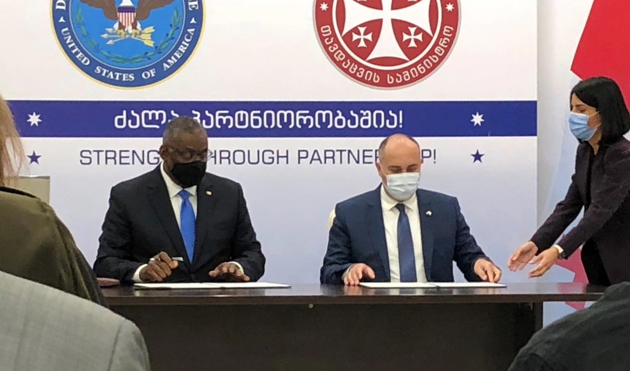 Georgian Defense Minister Juansher Burchuladze and US Defense Secretary Lloyd Austin sign a memorandum of understanding on military cooperation.
