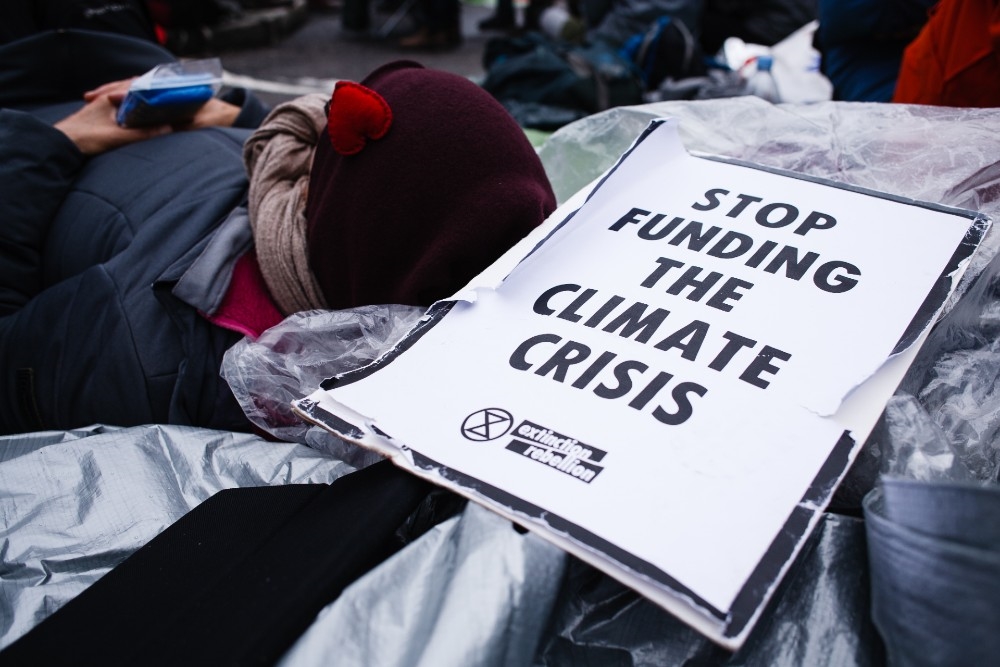 Extinction Rebellion activists protest on the Bank junction outside the Bank of America (Credit: Getty images)