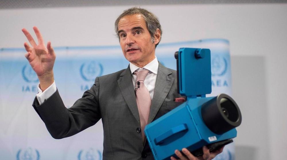 IAEA Chief Rafael Grossi presenting the surveillance cameras used at nuclear sites on December 17, 2021 (AFP)