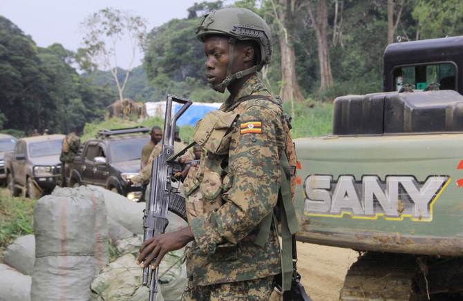 Burkina Faso gendarmes stand at a checkpost in Ouagadougou on August 14, 2017, a day after a deadly attack by gunmen on a restaurant the previous night (AFP)