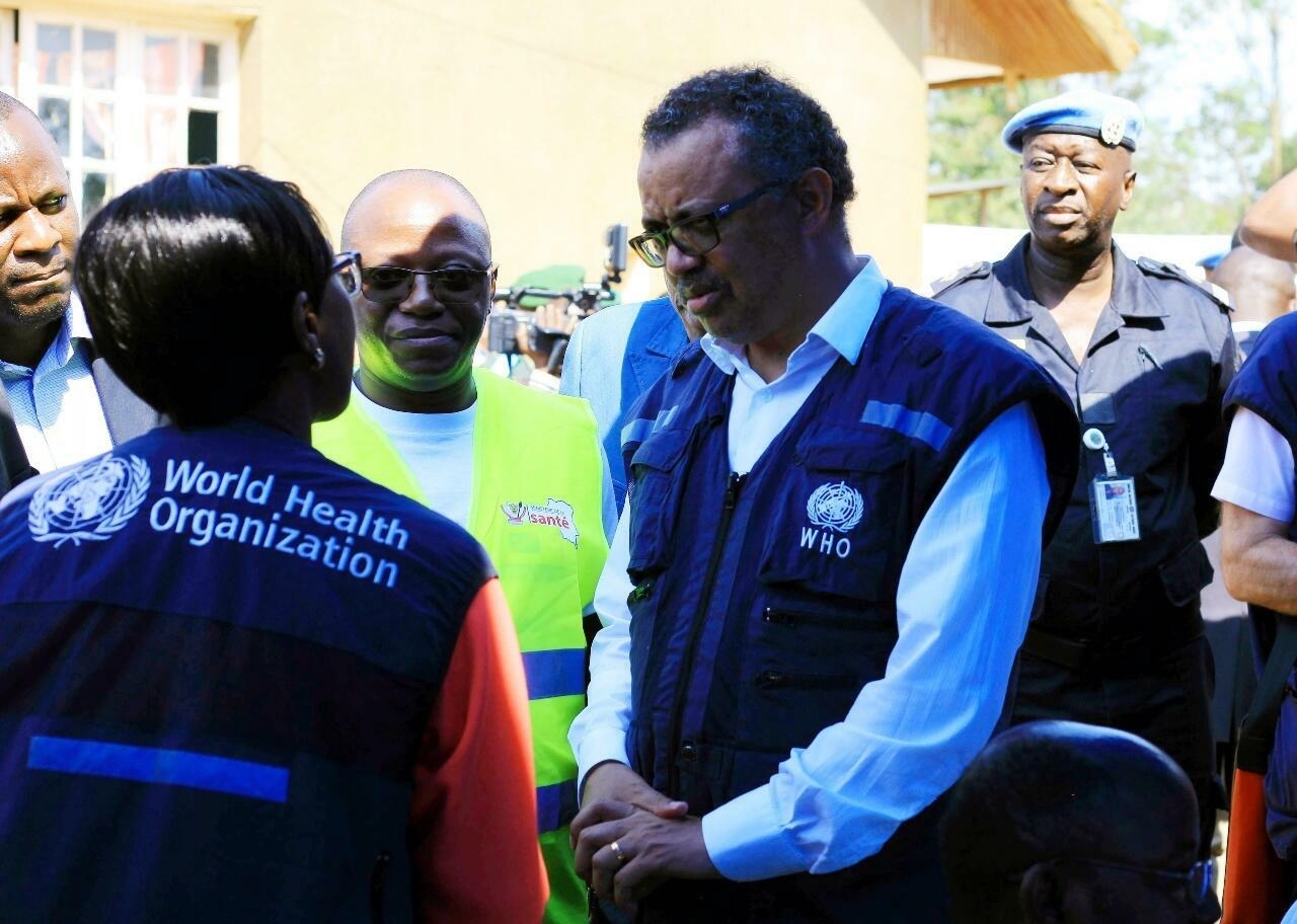 WHO Director General speaks to a health official in Beni, DRC, on August 10, 2018