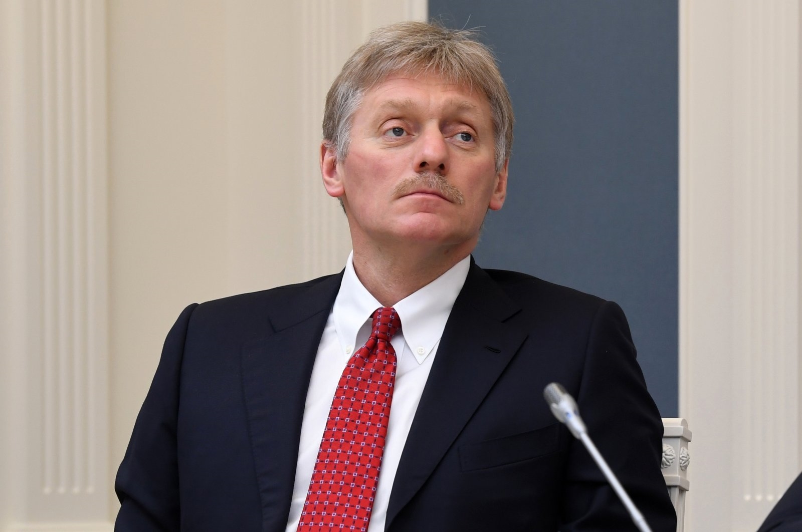 Kremlin spokesman Dmitry Peskov attends a video conference with Russian President Vladimir Putin in the Kremlin in Moscow, Russia, April 14, 2020