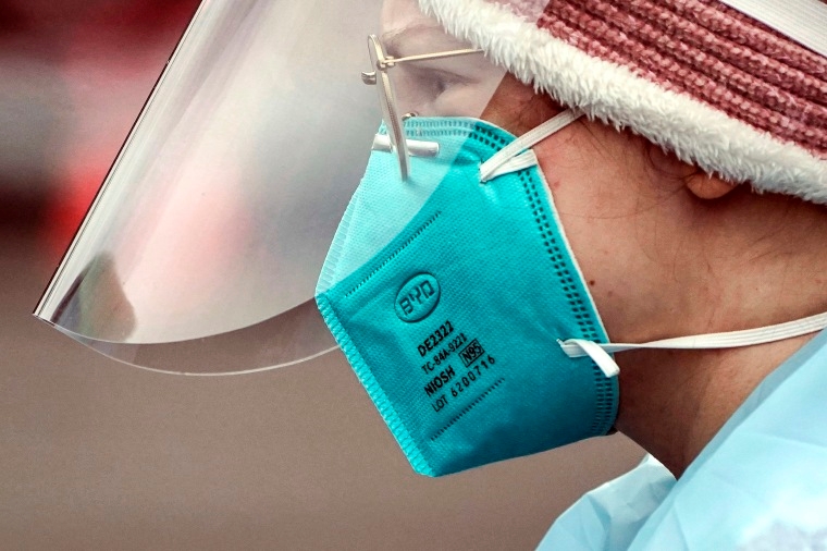 A medical assistant wearing an N95 mask in Washington, United States