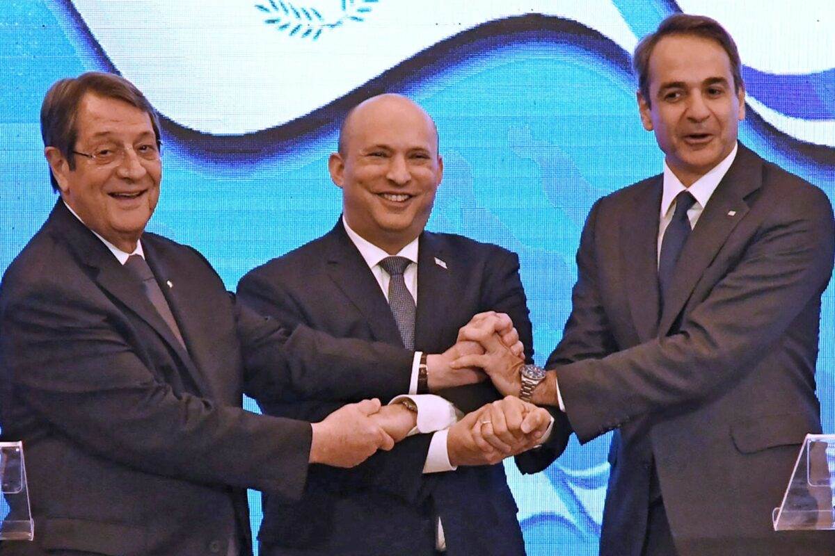 Cypriot President Nicos Anastasiades, Israeli Prime Minister Naftali Bennett, and his Greek counterpart Kyriakos Mitsotakis in occupied Al-Quds on December 7, 2021 (AFP)