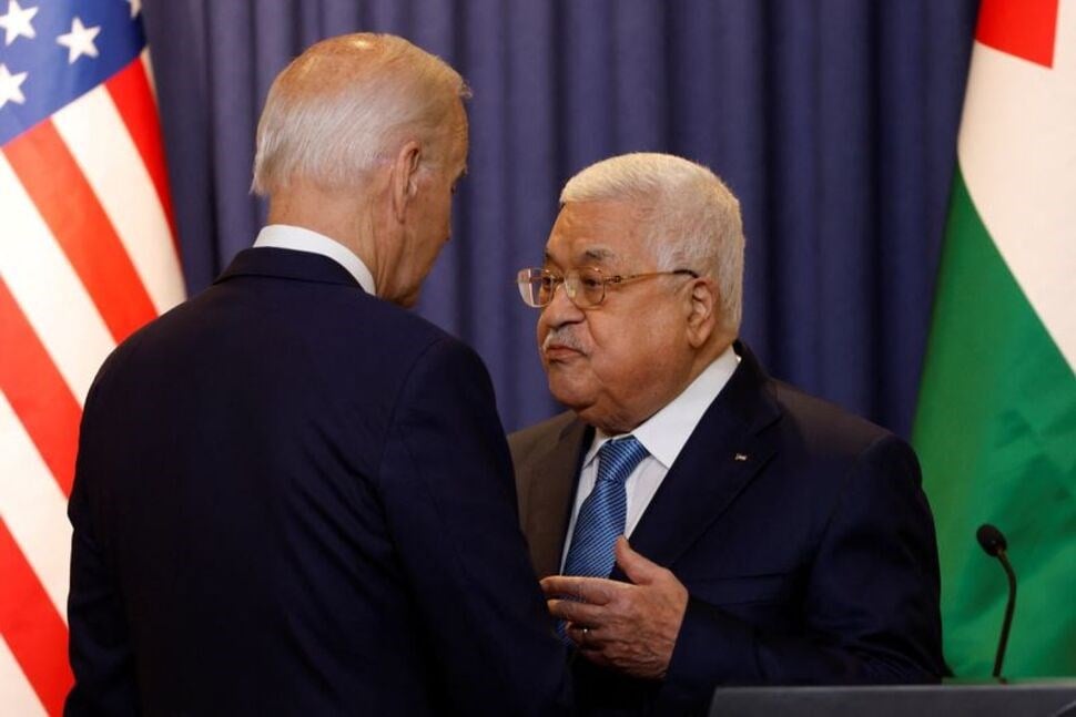 Palestinian President Mahmoud Abbas and U.S. President Joe Biden speak after a statement, in Bethlehem in the Israeli-occupied West Bank July 15, 2022. REUTERS