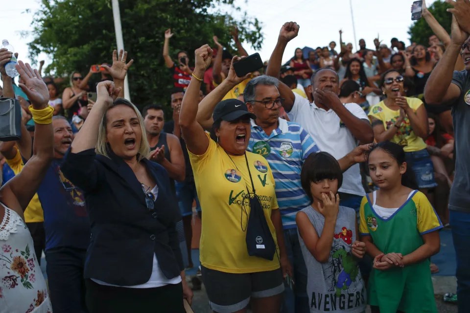 Supporters of former lawmaker Roberto Jefferson protest against his arrest next to his house in Levy Gasparian, Rio de Janeiro state, Brazil, Sunday, Oct. 23, 2022.Source: [