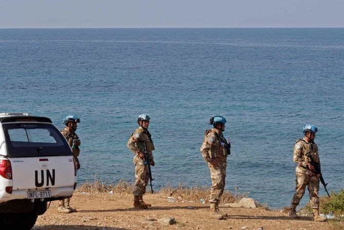 Members of the United Nations peacekeeping force in Lebanon (UNIFIL) patrol the coastal road in Naqura, the southernmost Lebanese town by the border with Israel, on October 24, 2022. (AFP).