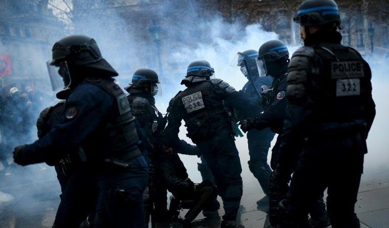 French police clash with protestors at farm reservoir site.