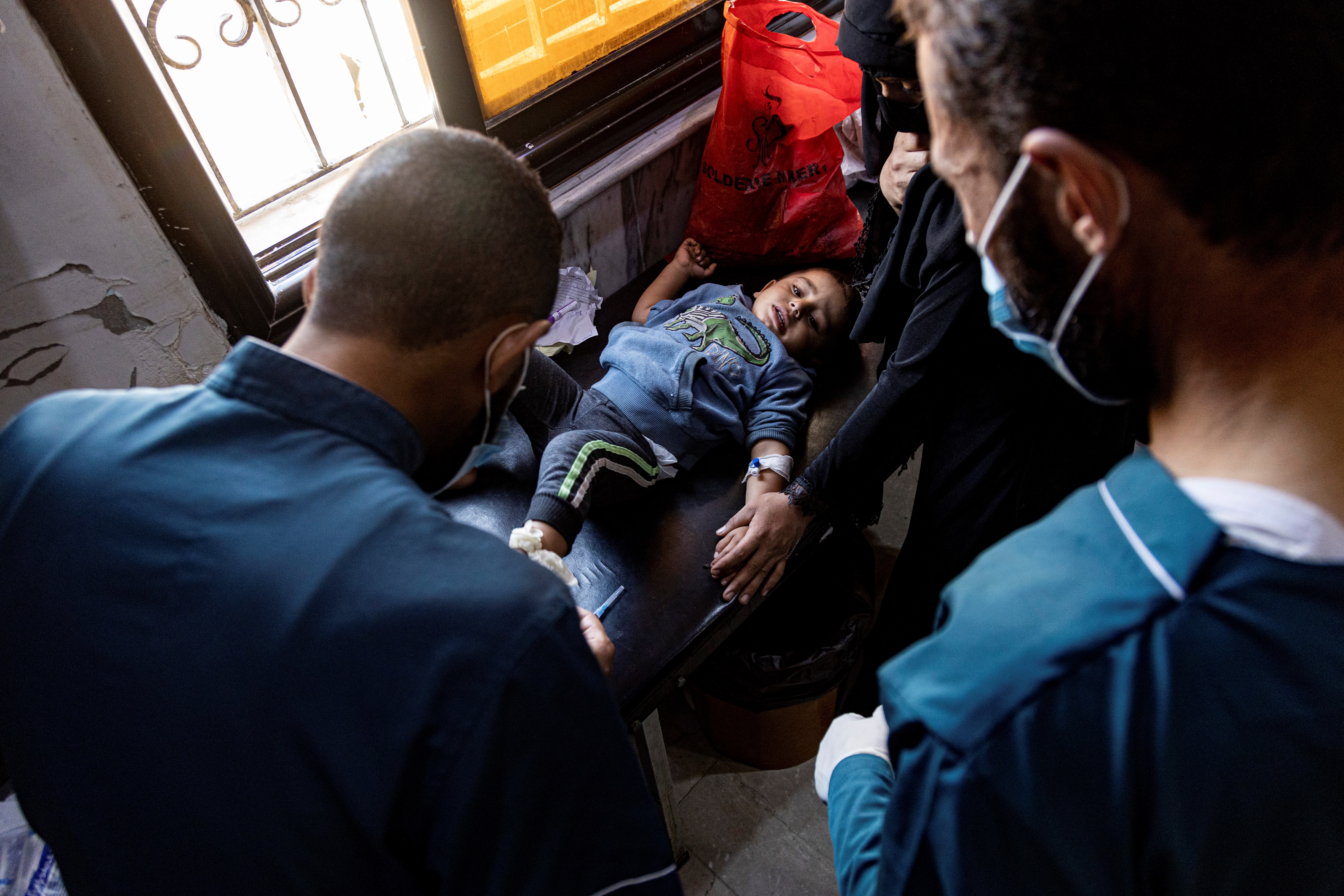 Medics treat a child diagnosed with cholera in a hospital in Deir el-Zour, Syria, Thursday, Sept. 29, 2022 (AP Photo/Baderkhan Ahmad)