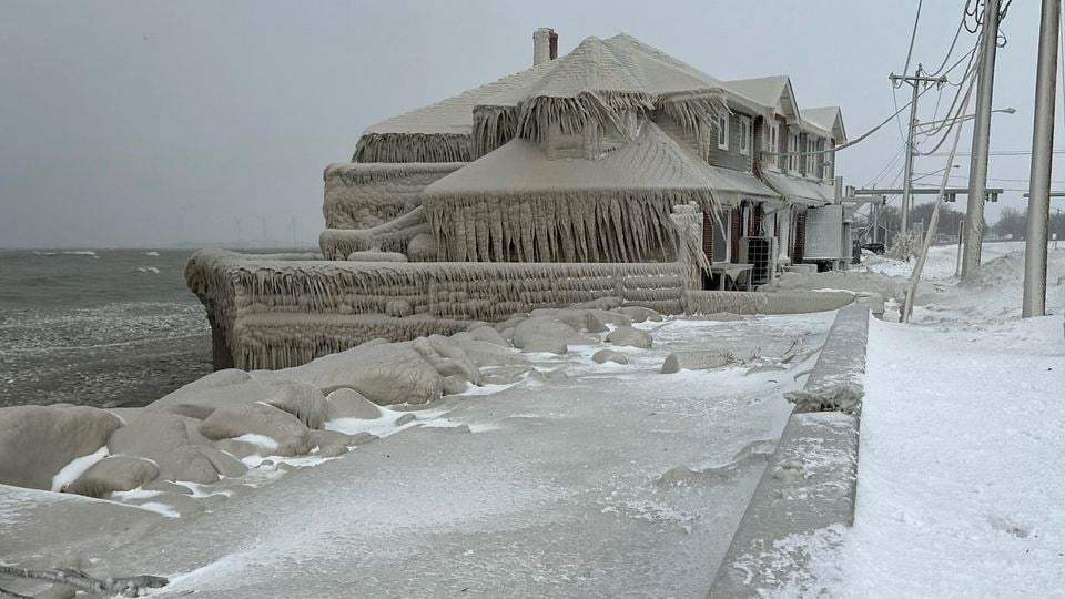Hoak's restaurant is covered in ice from the spray of Lake Erie waves during a winter storm that hit the Buffalo, New York (Reuters)