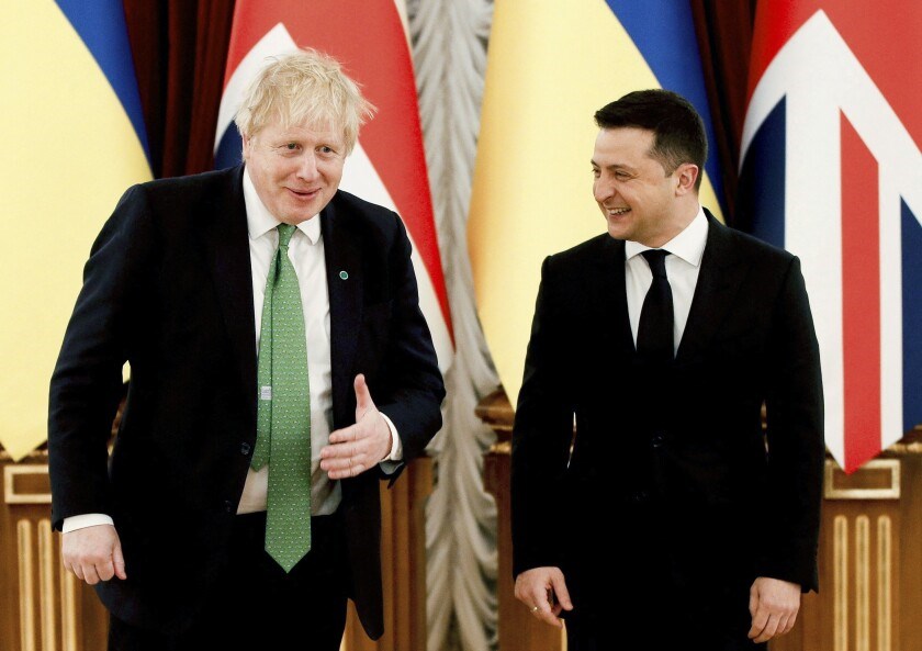 British UK, Ukraine call for 'comBritain’s Prime Minister Boris Johnson and Ukrainian President Volodymyr Zelensky at the presidential palace in Kiev