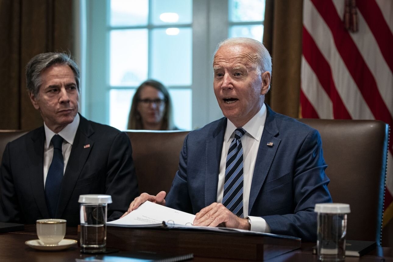 Secretary of State Antony Blinken listens as President Biden speaks at a cabinet meeting at the White House, July 20. (Bloomberg)