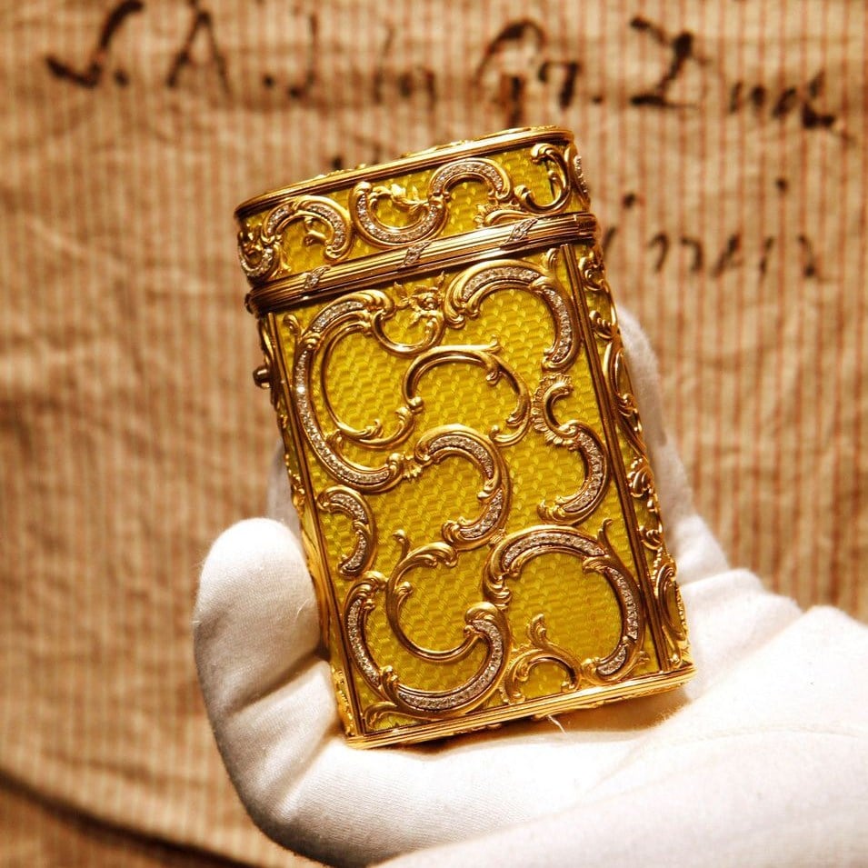 A Faberge jeweled gold and enamel cigarette case and dating from 1899-1903, at Sotheby's auction house in London