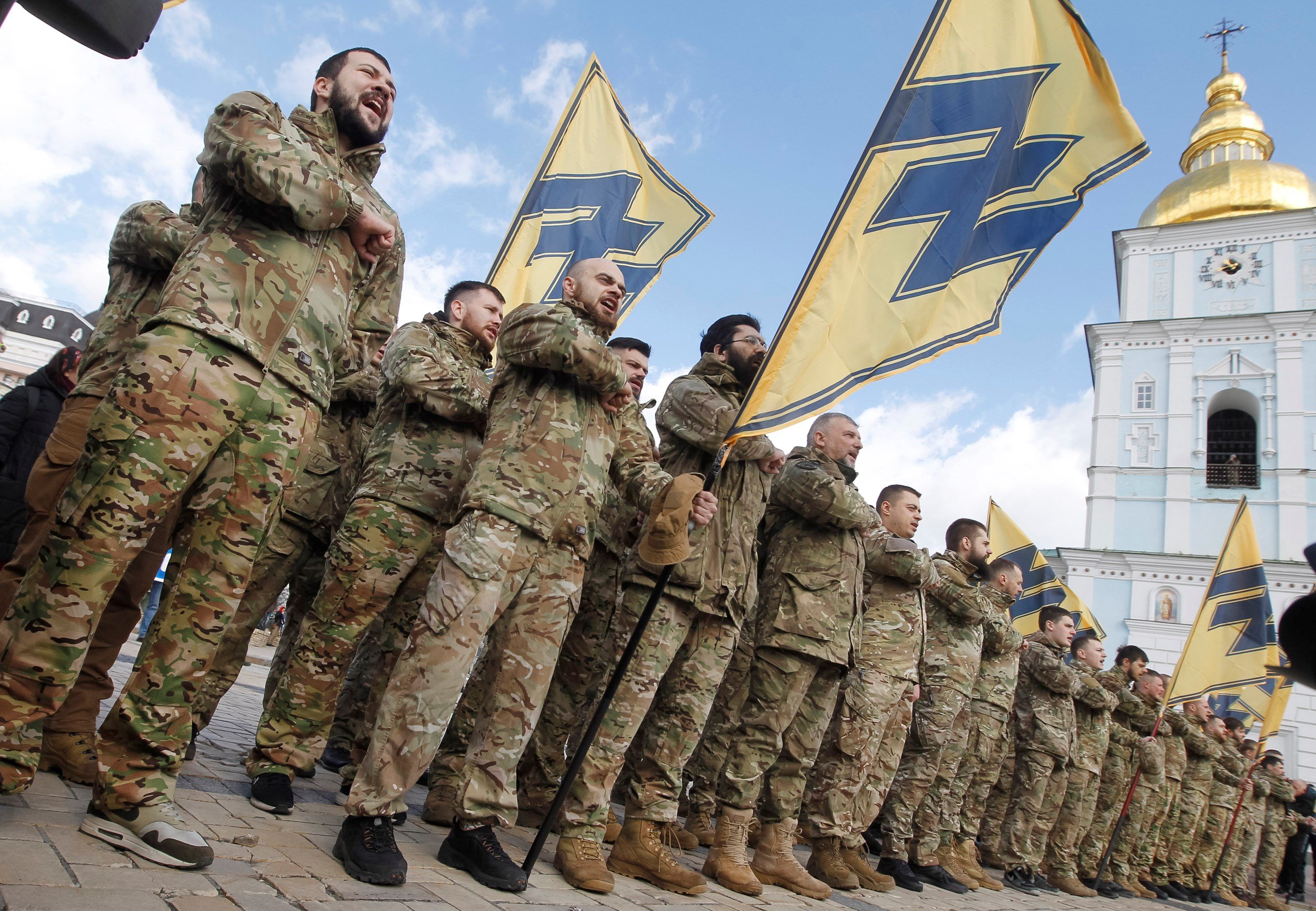 Ukrainian veterans of the Azov Battalion, formed by a white supremacist, attend a rally in Kiev on March 14, 2020