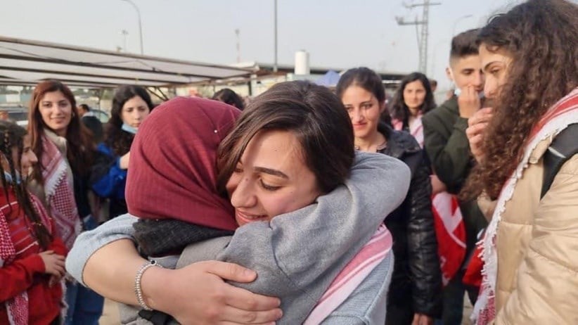21-year old Palestinian female prisoner in her mother's arms