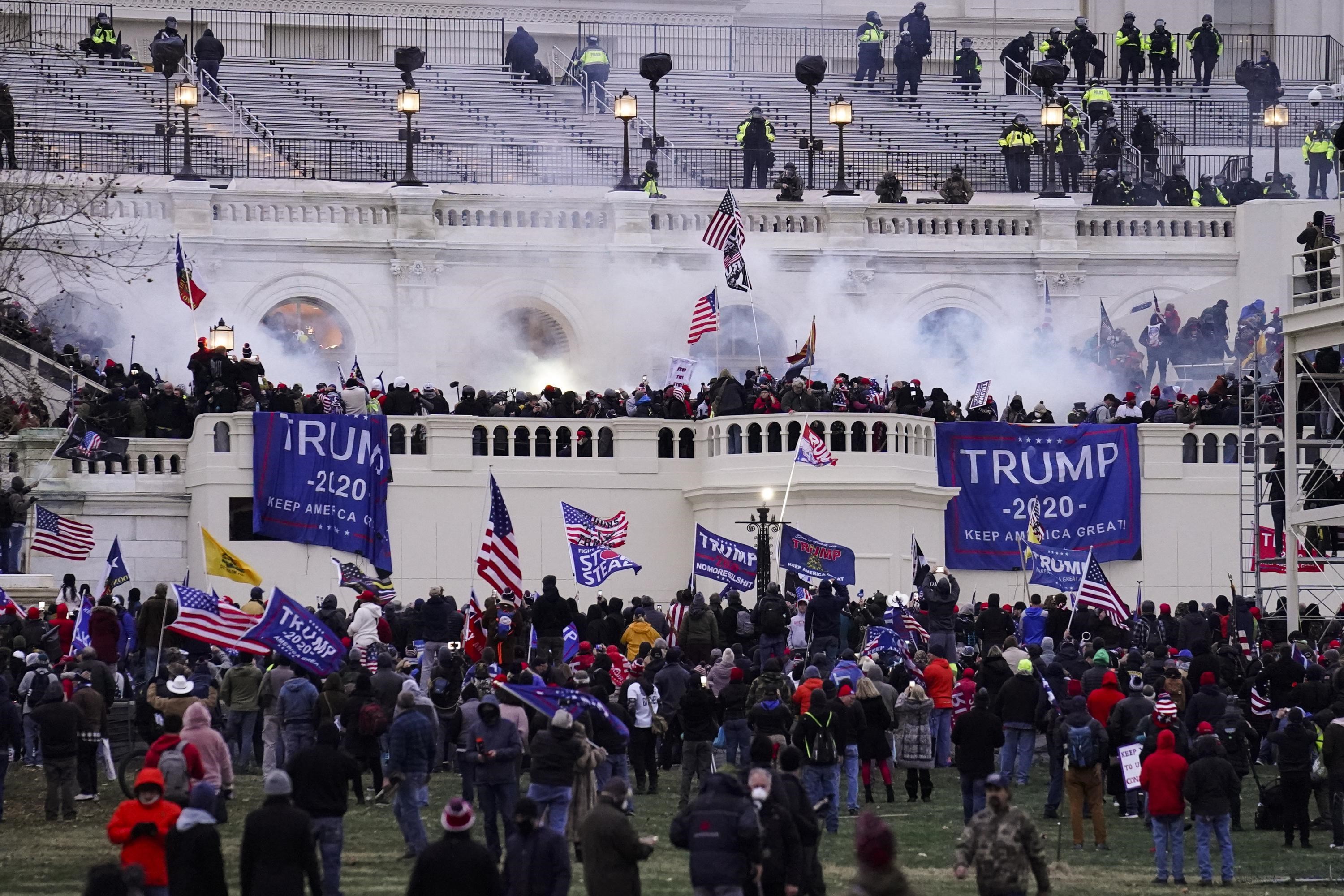 Violent insurrectionists loyal to President Donald Trump, storm the Capitol, Jan. 6, 2021, in Washington.