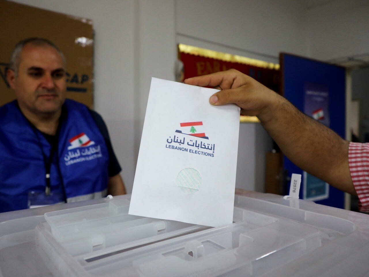 A Lebanese citizen casting his ballot in the 2022 legislative elections