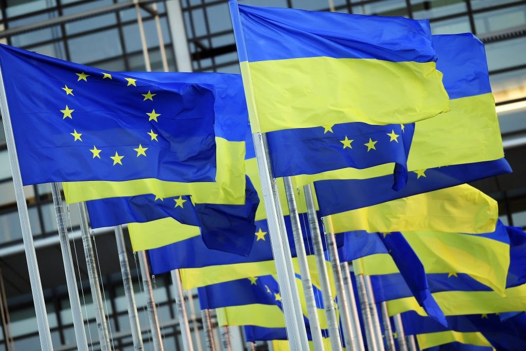 EU flags and Ukrainian flags flying near the European Parliament in Strasbourg, eastern France, March 7, 2022 (AFP)