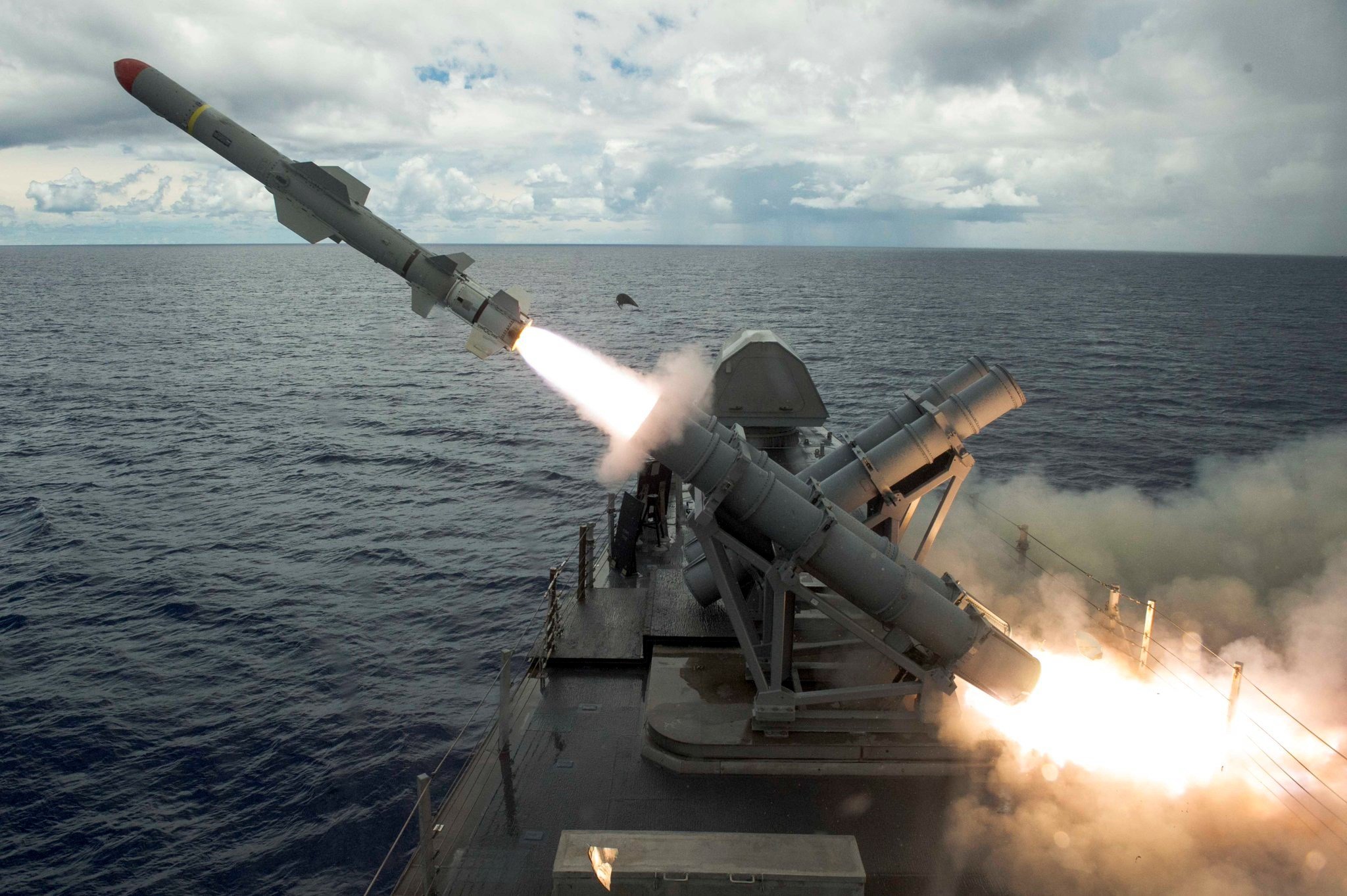A harpoon missile launches from the missile deck of the USS Coronado off the coast of Guam, August 22, 2017