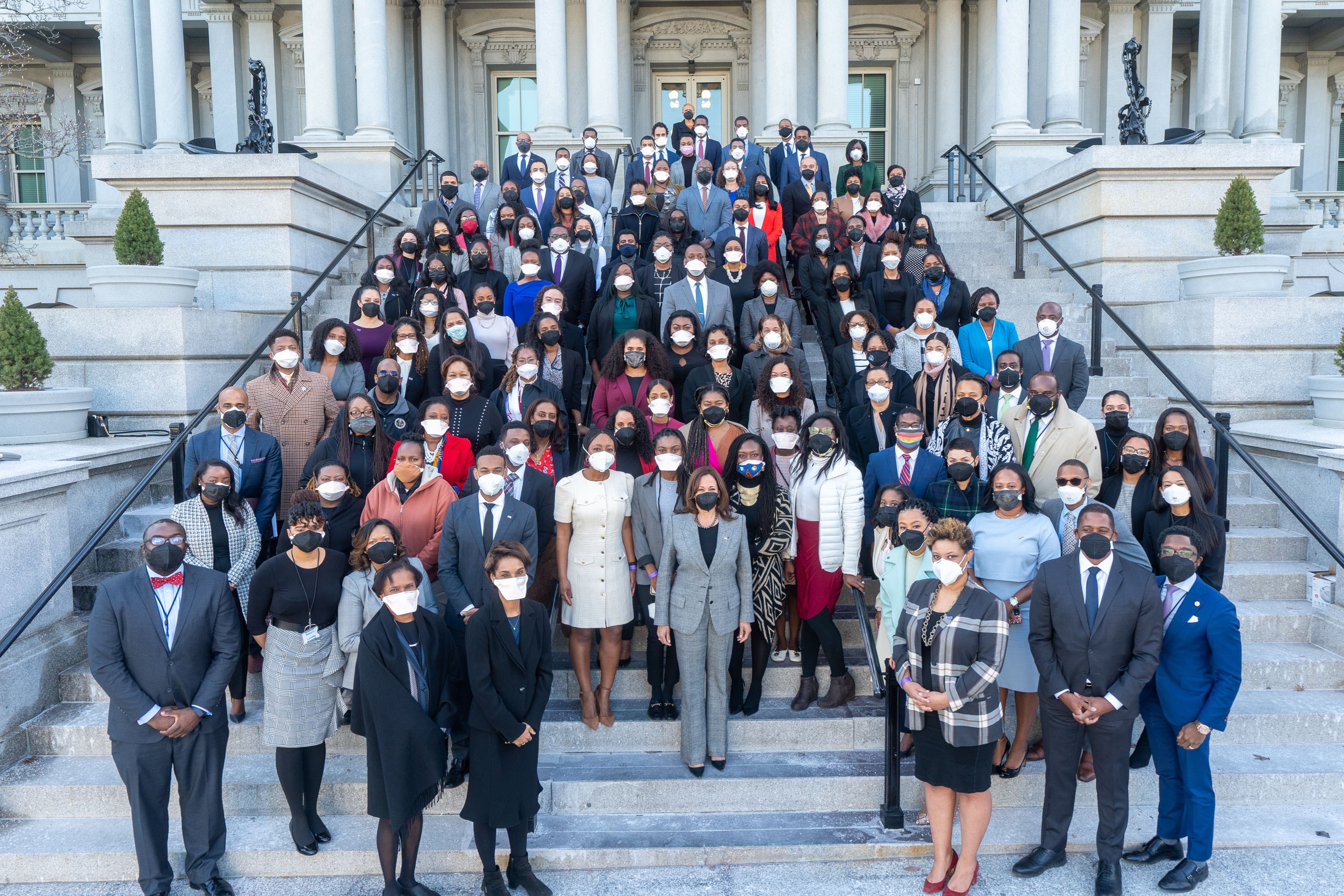 Black staffers from across the White House posing with Vice President Kamala Harris in celebration of Black History Month on February 4, 2022