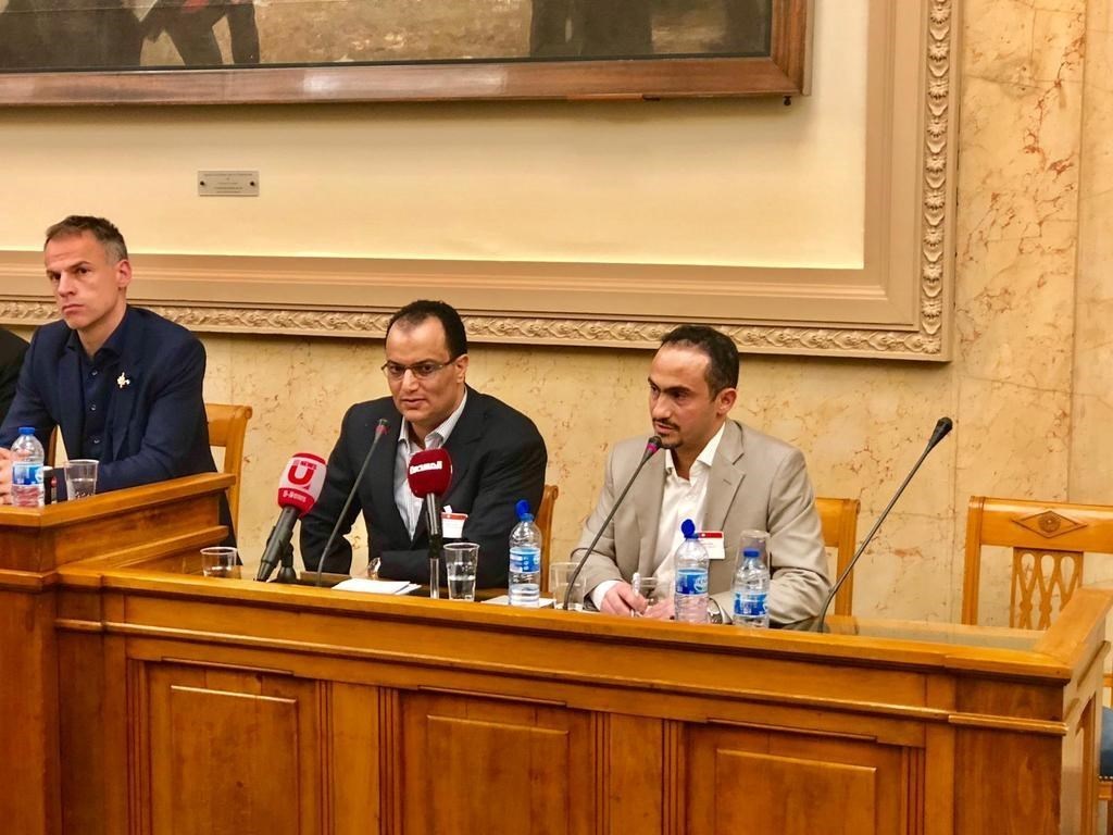 Member of the Sanaa negotiating delegation, Abdul-Malik Al-Ajri (center)