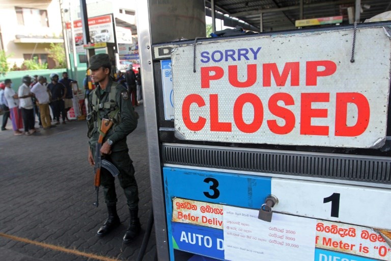 Bankrupt Sri Lanka opens oil market to foreign firms.