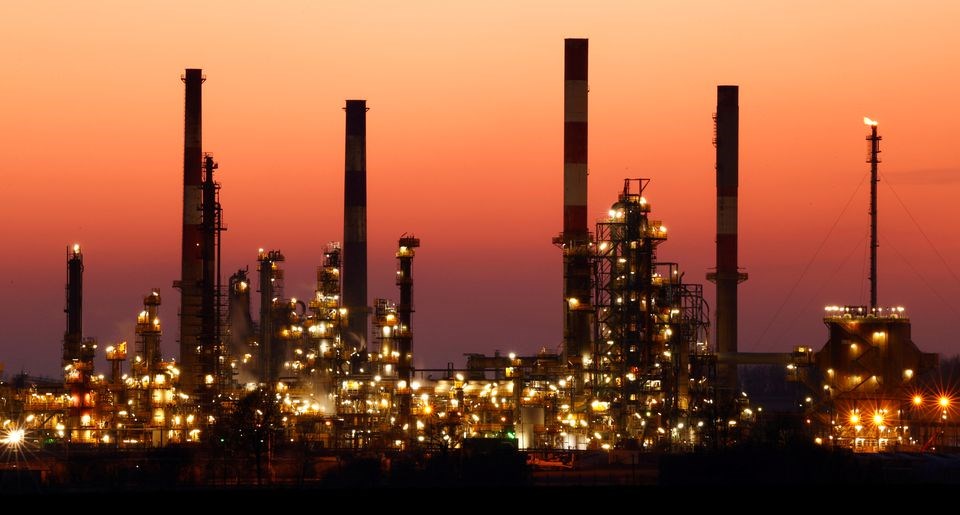 The Total Grandpuits oil refinery seen just after sunset, southeast of Paris, France, March 1, 2021. (Reuters)