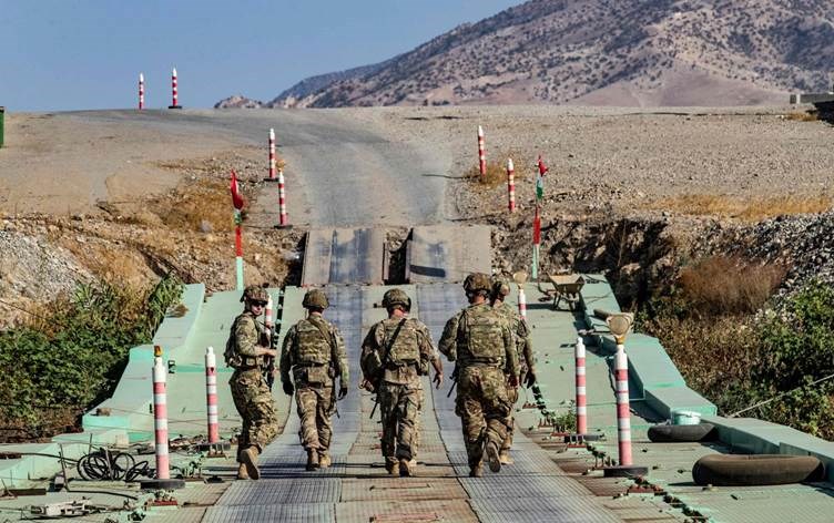 US soldiers patrolling an area in Syria on November 1, 2021. (AFP)