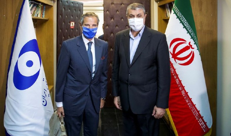 IAEA Director General Rafael Grossi meets with head of Iran's Atomic Energy Organization Mohammad Eslami, in Tehran, Iran