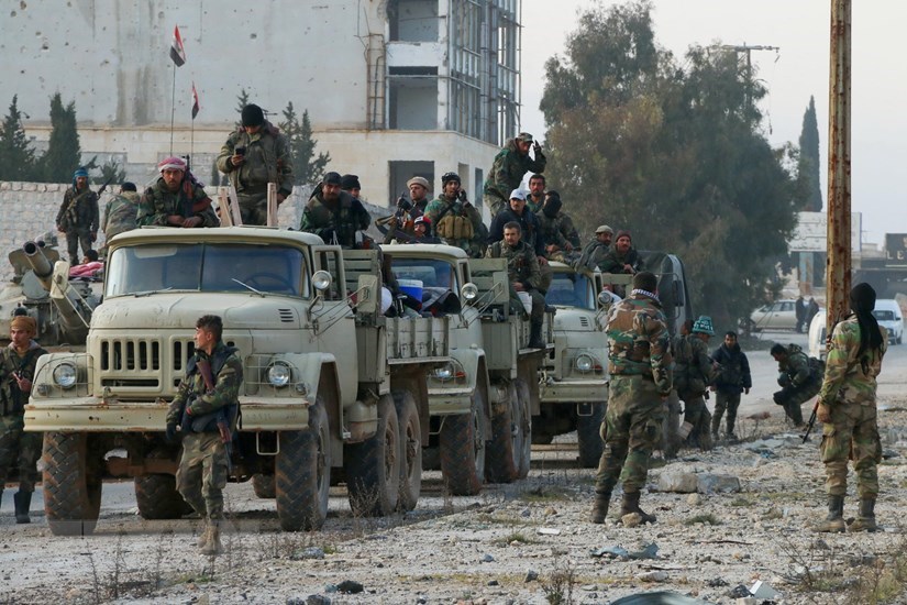 Syrian soldiers advance on a road in the northern Aleppo countryside on Feb 17, 2020 (AFP)