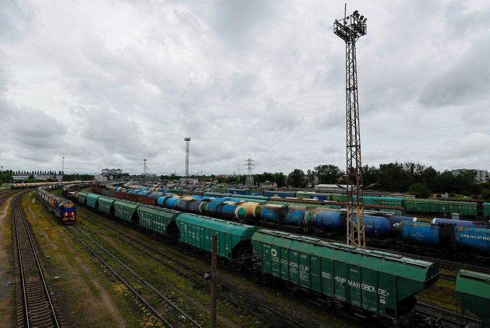 A view shows a freight train and cars, following Lithuania's ban of the transit of goods through the Russian exclave of Kaliningrad (Reuters)
