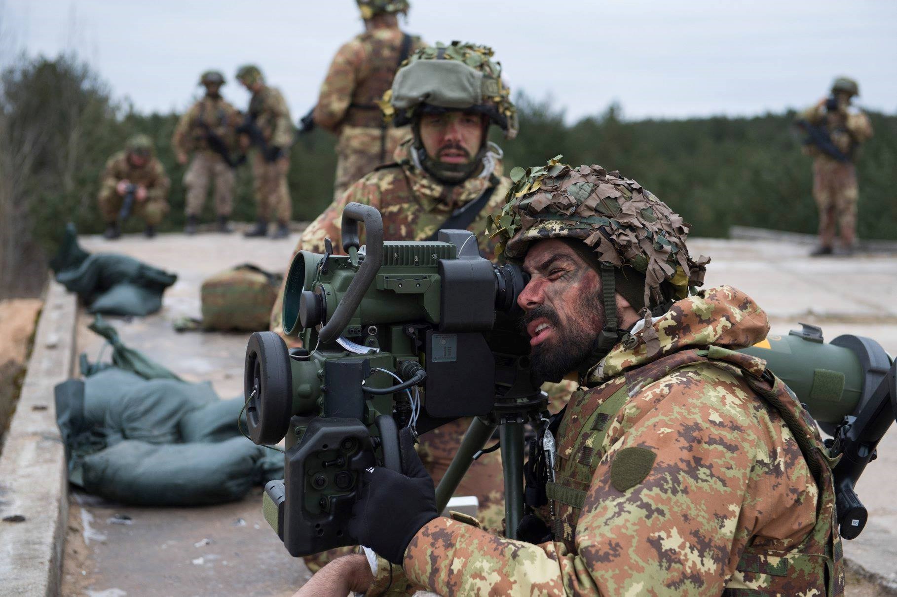 Italian soldier of the enhanced Forward Presence Battlegroup Latvia Holding an Israeli Spike ATGM in Camp Ādaži training area (NATO handout)