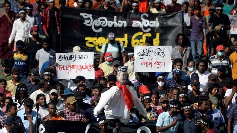 Sri Lanka begins vote to replace fleeing president.