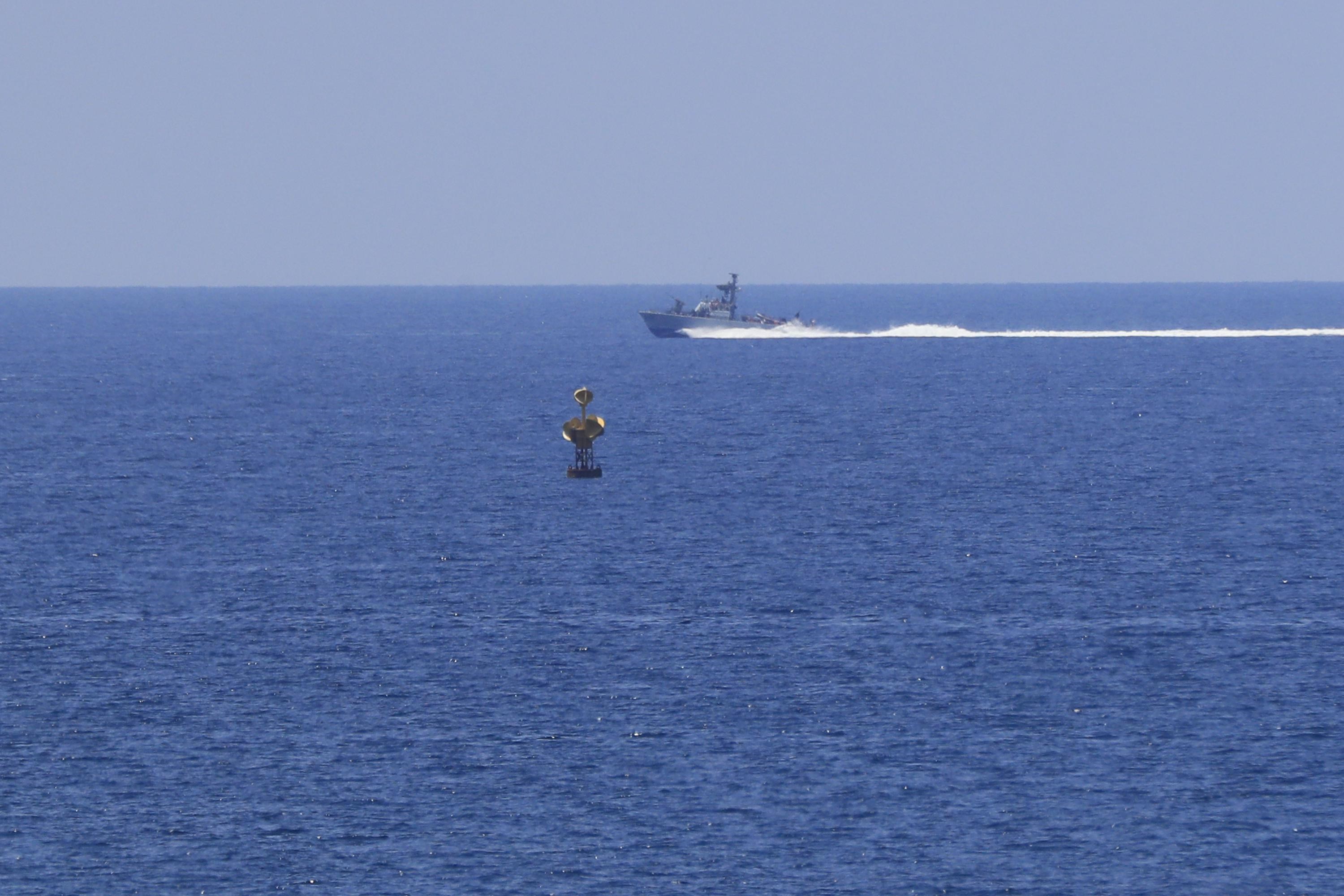 An Israeli occupation vessel patrols in the Mediterranean Sea