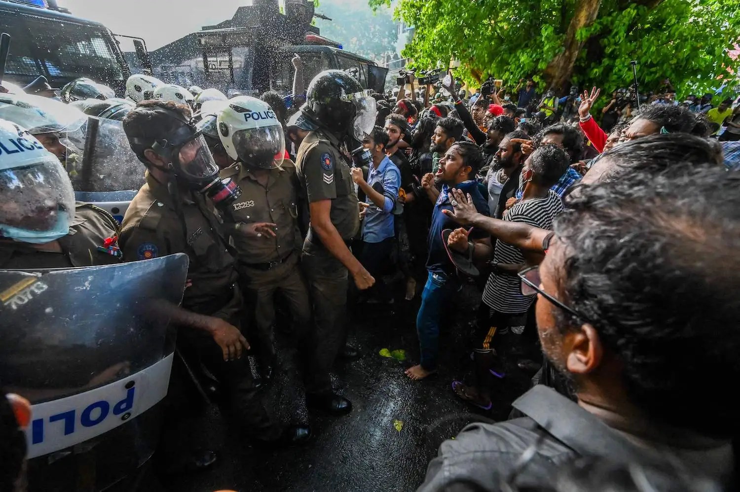 University students speak with police during a demonstration demanding the resignation of Sri Lankan President Gotabaya Rajapaksa in Colombo, Sri Lanka, on May 19, 2022 (Getty)