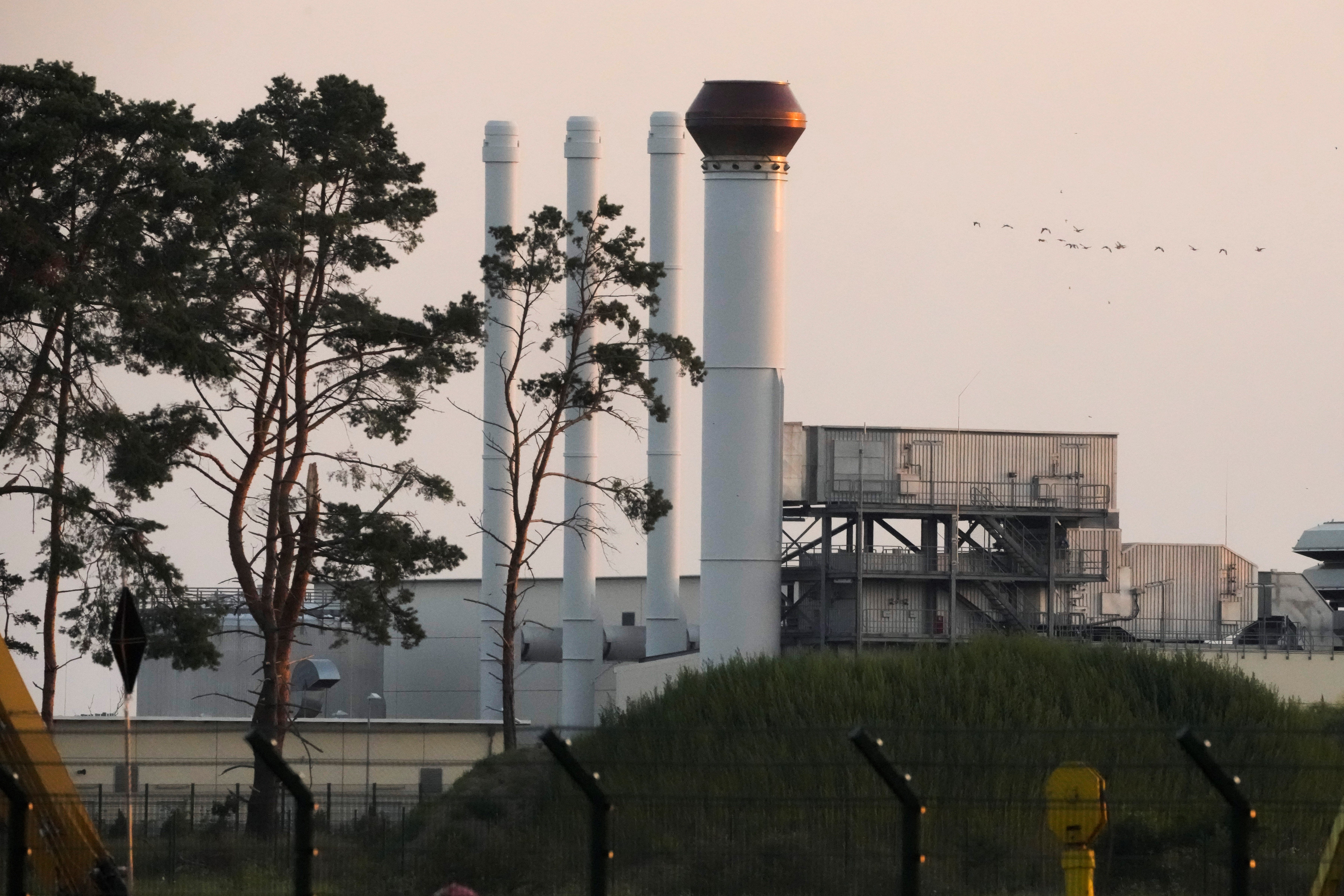 This photo shows the landfall facility of the Nord Stream 1 Baltic Sea pipeline and the transfer station of the OPAL gas pipeline, the Baltic Sea Pipeline Link, in Lubmin, Germany, Thursday, July 21, 2022 (AP Photo/Markus Schreiber)