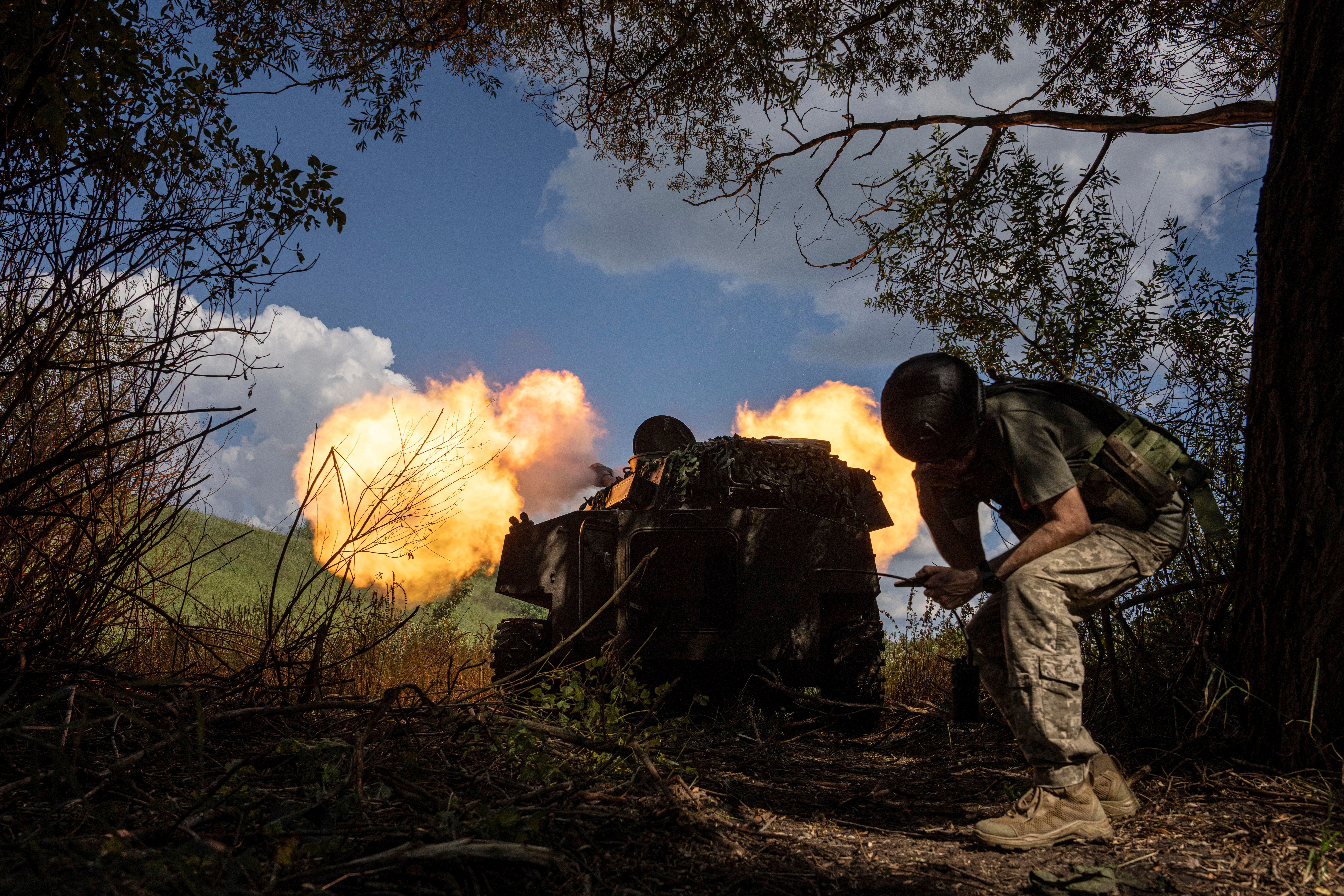 Ukrainian self-propelled artillery shoots towards Russian forces at a frontline in Kharkov region, Ukraine, Wednesday, July 27, 2022 (AP Photo/Evgeniy Maloletka)
