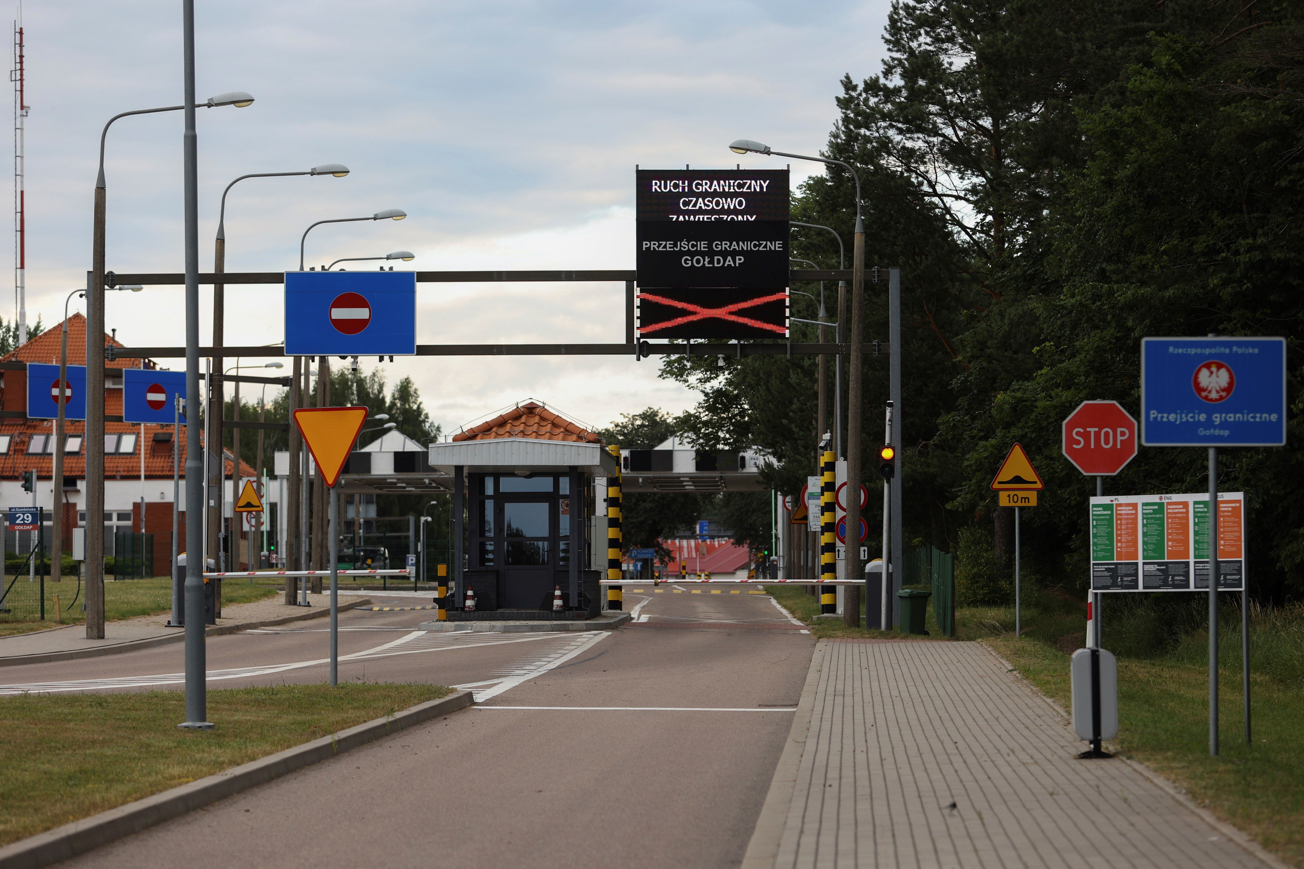 A welcome to European Union sign stand at the closed border crossing between Poland and Kaliningrad Oblast, in Goldap, Poland, Thursday, July 7, 2022. (AP Photo/Michal Dyjuk)