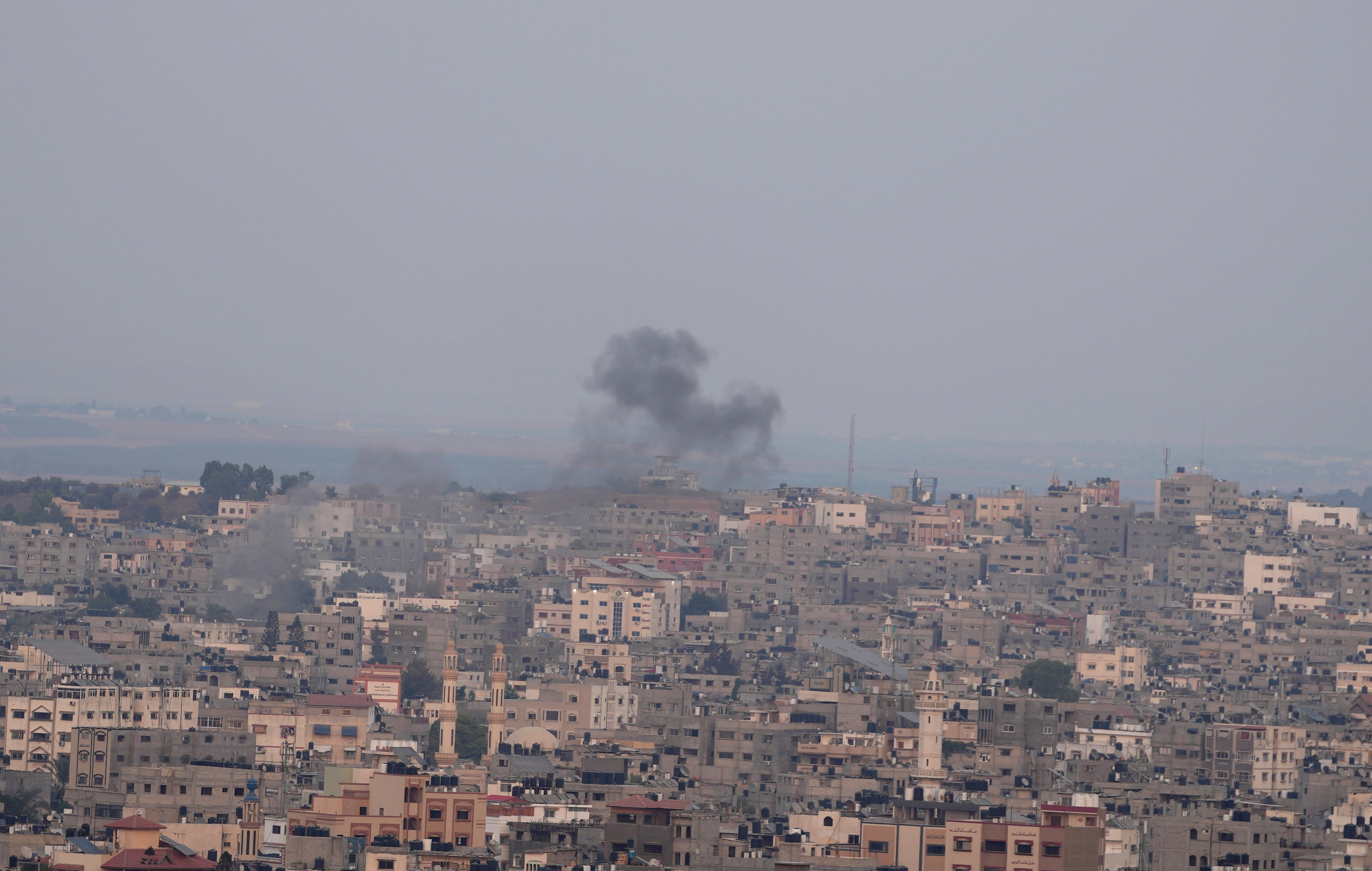 Smoke rises following Israeli airstrikes on a building in Gaza City, Friday, Aug. 5, 2022 (AP Photo/Hatem Moussa)