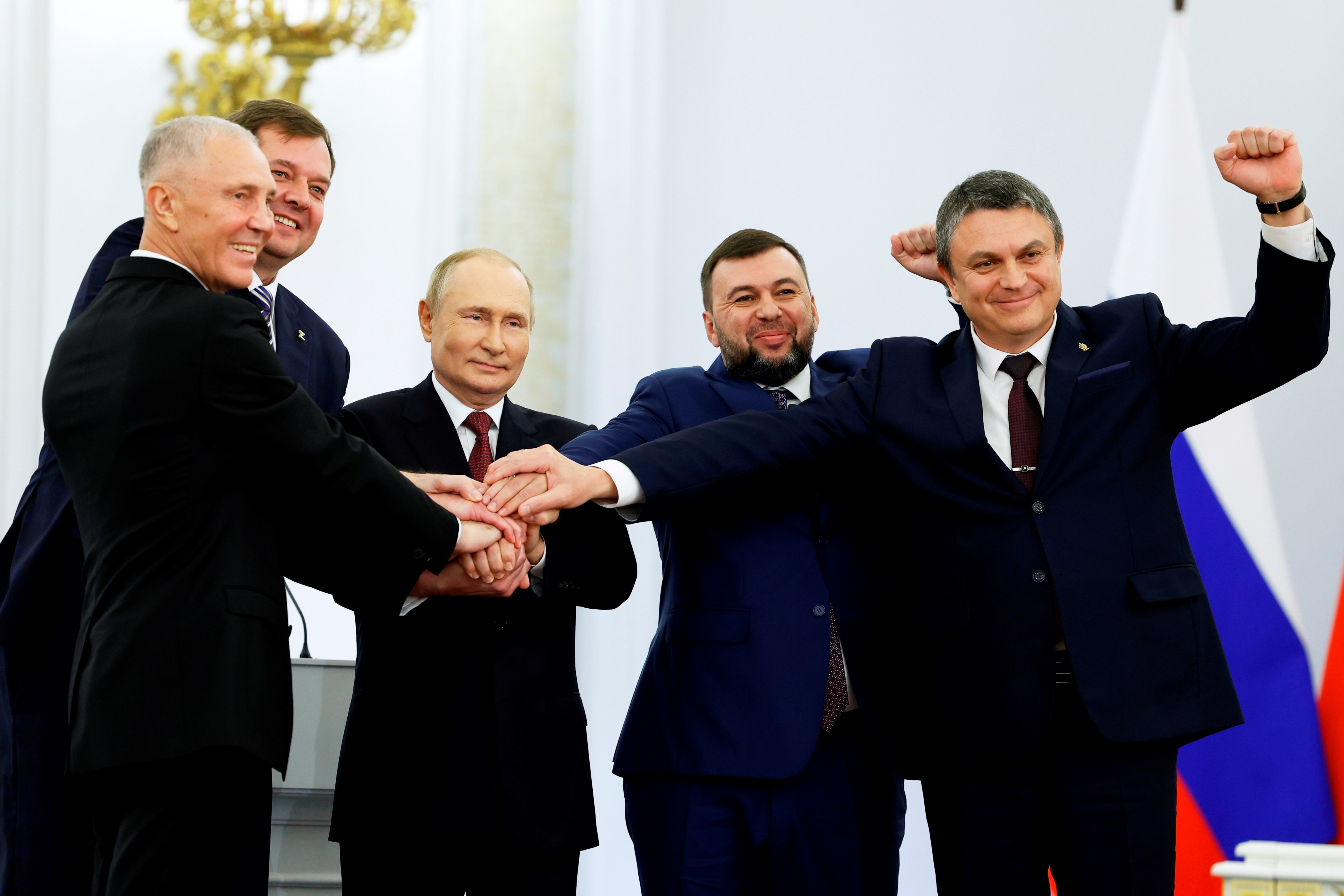 Russian President Vladimir Putin with the heads of the regions and republics that joinded the Russian Federation at the Kremlin in Moscow, Friday, Sept. 30, 2022 (Dmitry Astakhov, Sputnik, Government Pool Photo via AP)