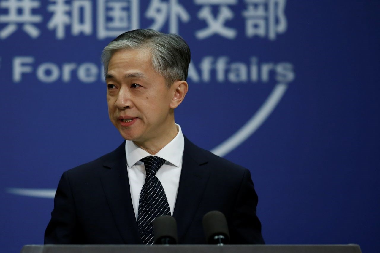 Chinese Foreign Ministry spokesman Wang Wenbin during a news conference (Reuters)