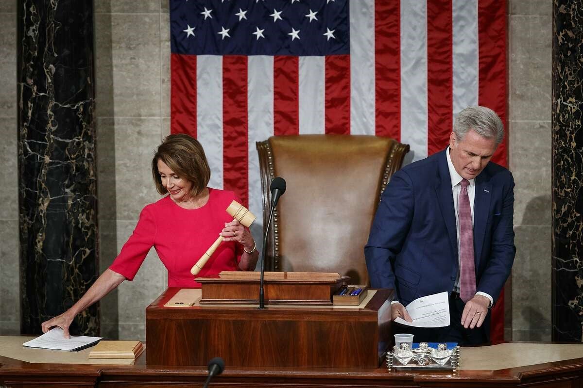 Nancy Pelosi holds the gavel as Rep. Kevin McCarthy leaves the dais, Thursday, Jan. 3, 2019 (AP)