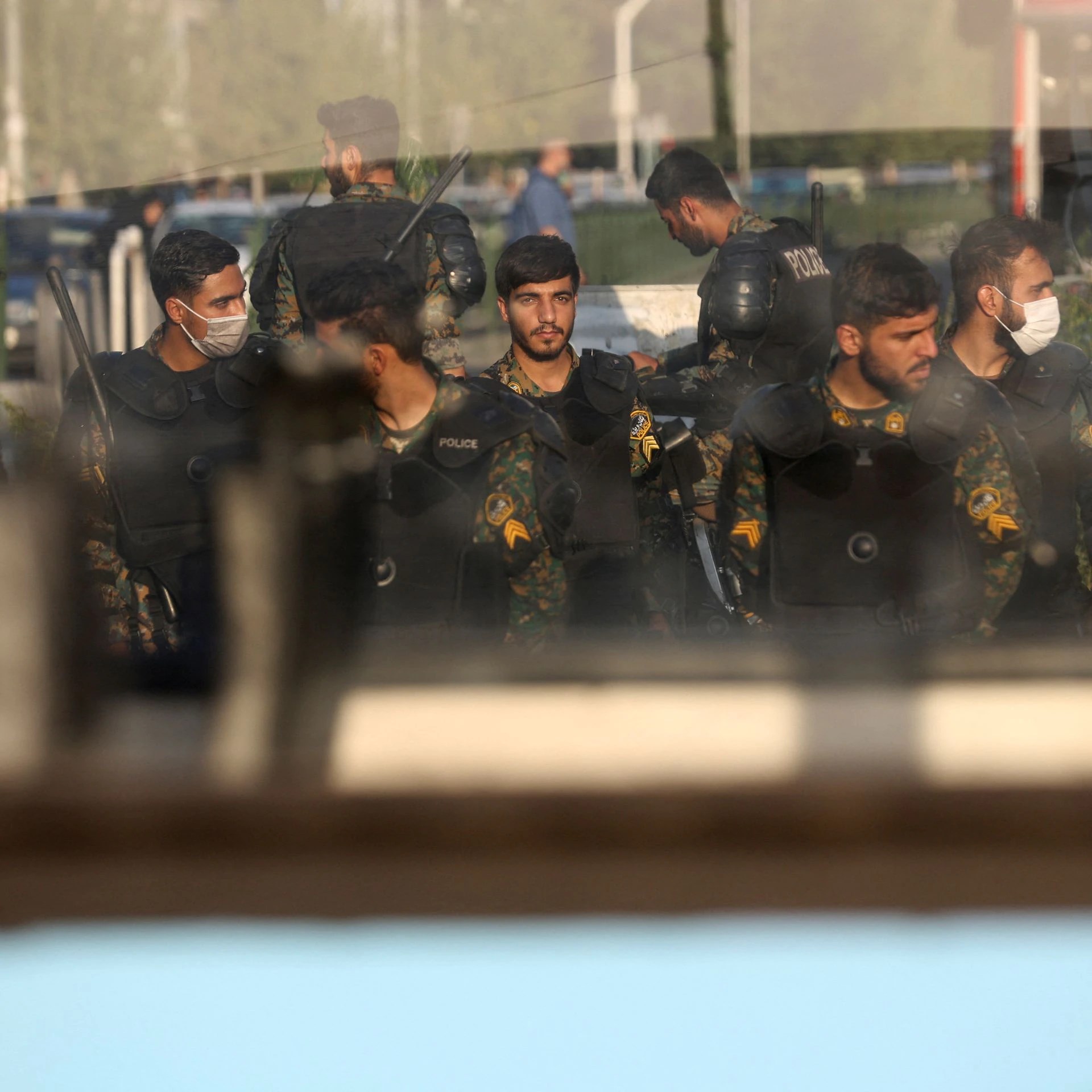 Iranian police officers stand in a street in Tehran, Iran October 3, 2022 (Reuters)